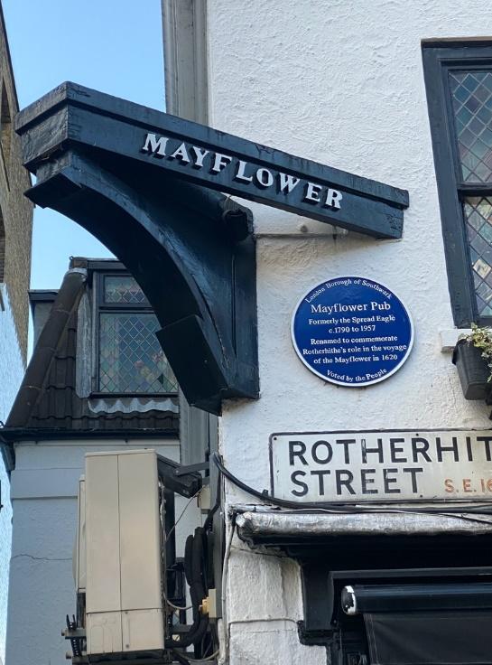 A street sign on the side of a building

Description automatically generated with medium confidence